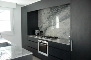 Kitchen in Brazilian Piracema granite, a grey coloured veined granite